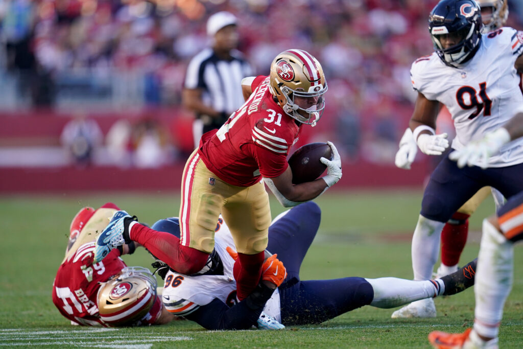 San Francisco 49ers running back Isaac Guerendo (31) runs the ball against the Chicago Bears in the third quarter at Levi's Stadium.