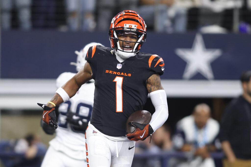 Cincinnati Bengals wide receiver Ja'Marr Chase (1) scores a touchdown against the Dallas Cowboys in the fourth quarter at AT&T Stadium.