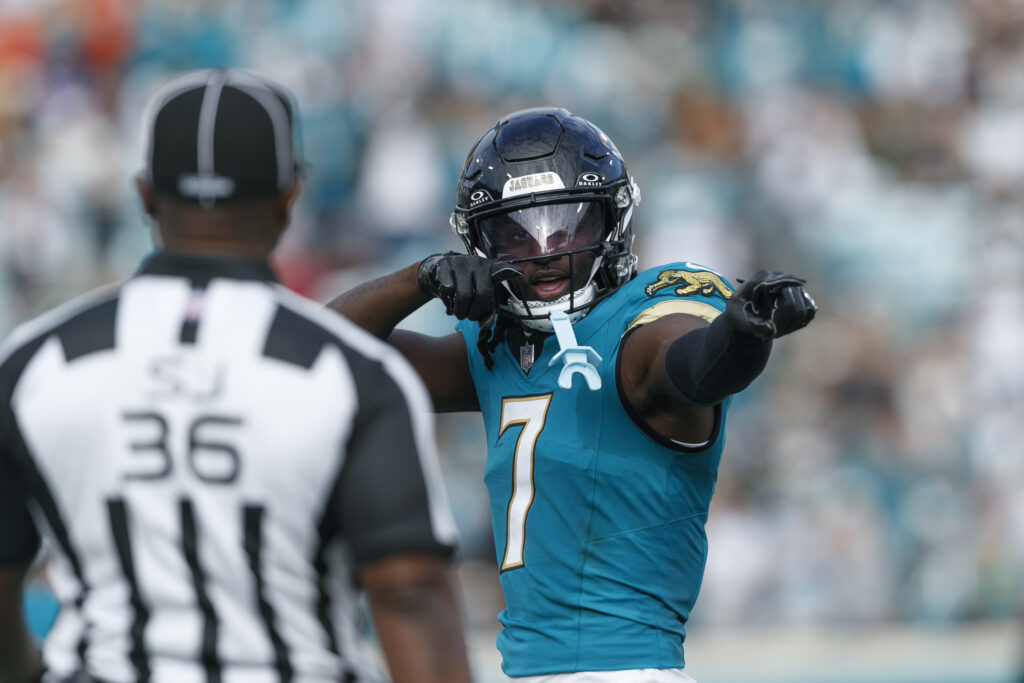 Jacksonville Jaguars wide receiver Brian Thomas Jr. (7) motions for first down against the New York Jets during the third quarter at EverBank Stadium.