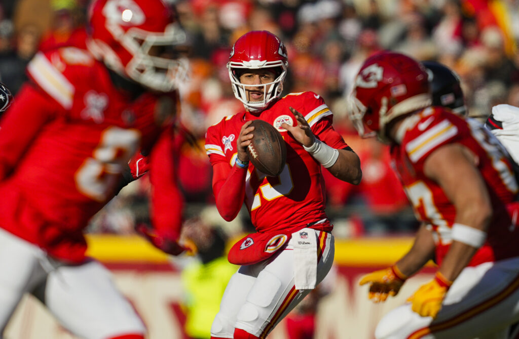 Kansas City Chiefs quarterback Patrick Mahomes (15) drops back to pass during the first half against the Houston Texans at GEHA Field at Arrowhead Stadium. 