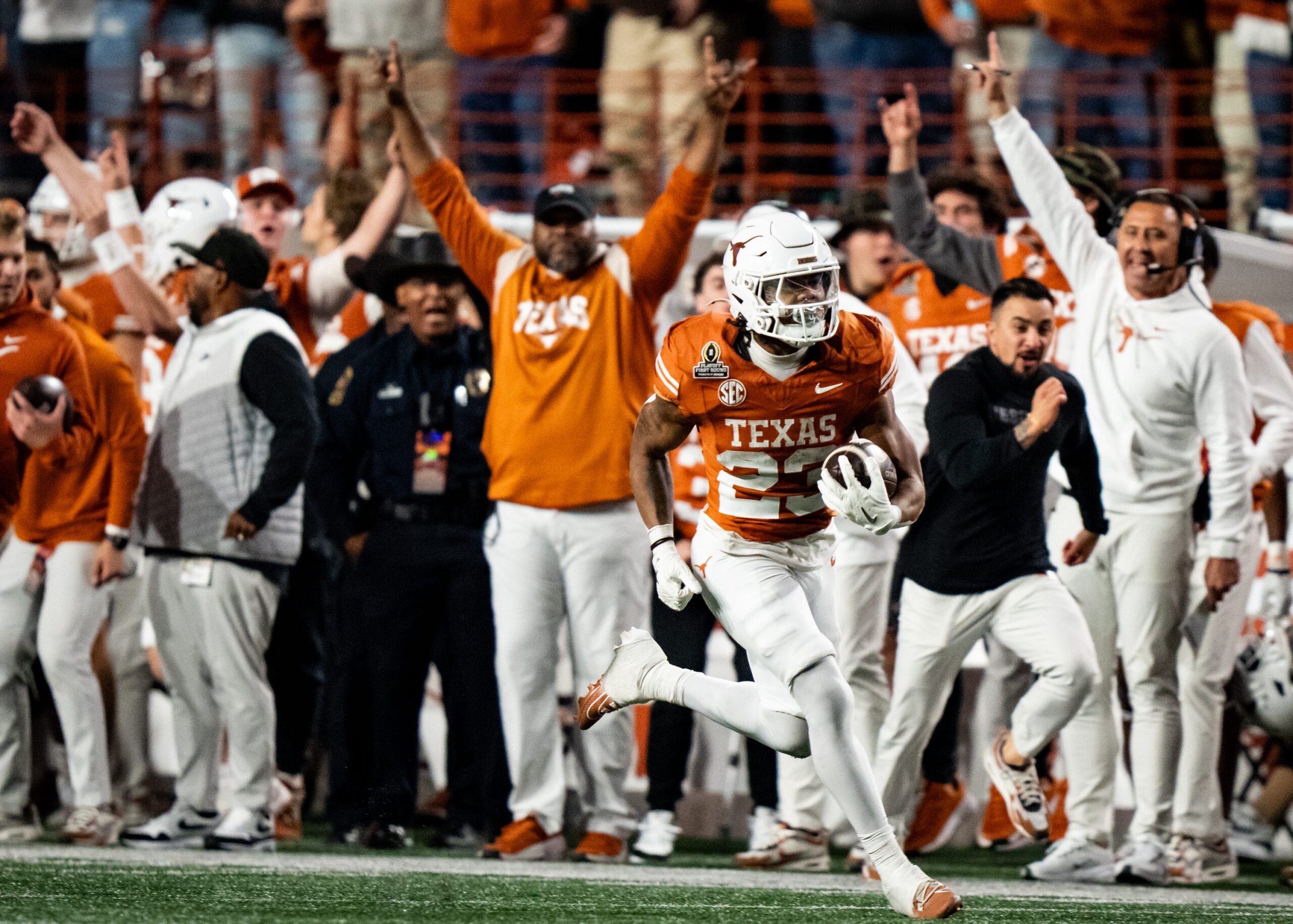 Texas Longhorns running back Jaydon Blue (23) runs the ball in for a touchdown in the fourth quarter as the Texas Longhorns play the Clemson Tigers in the first round of the College Football Playoffs.