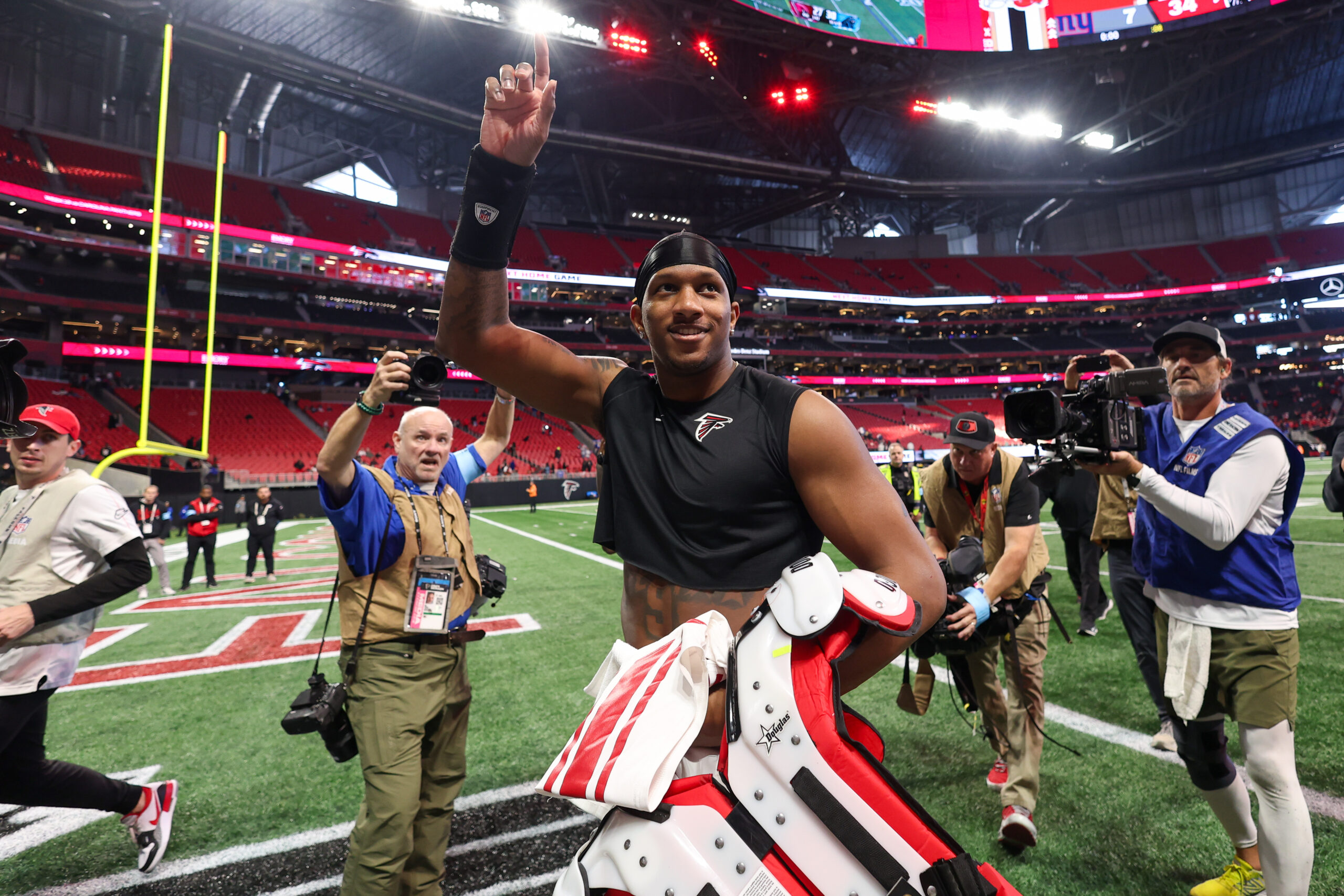 Atlanta Falcons quarterback Michael Penix Jr. (9) celebrates after a victory over the New York Giants at Mercedes-Benz Stadium.