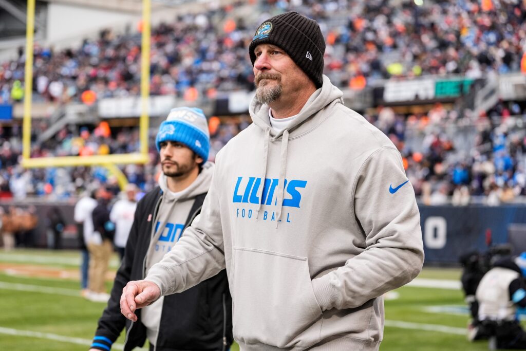 Detroit Lions head coach Dan Campbell takes the field before kickoff against Chicago Bears at Soldier Field in Chicago, Ill.