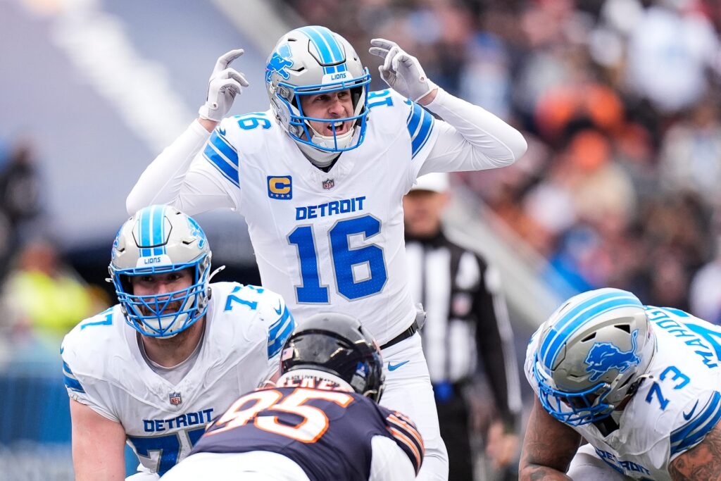 Detroit Lions quarterback Jared Goff (16) talks to teammates before a snap against Chicago Bears during the first half at Soldier Field in Chicago.