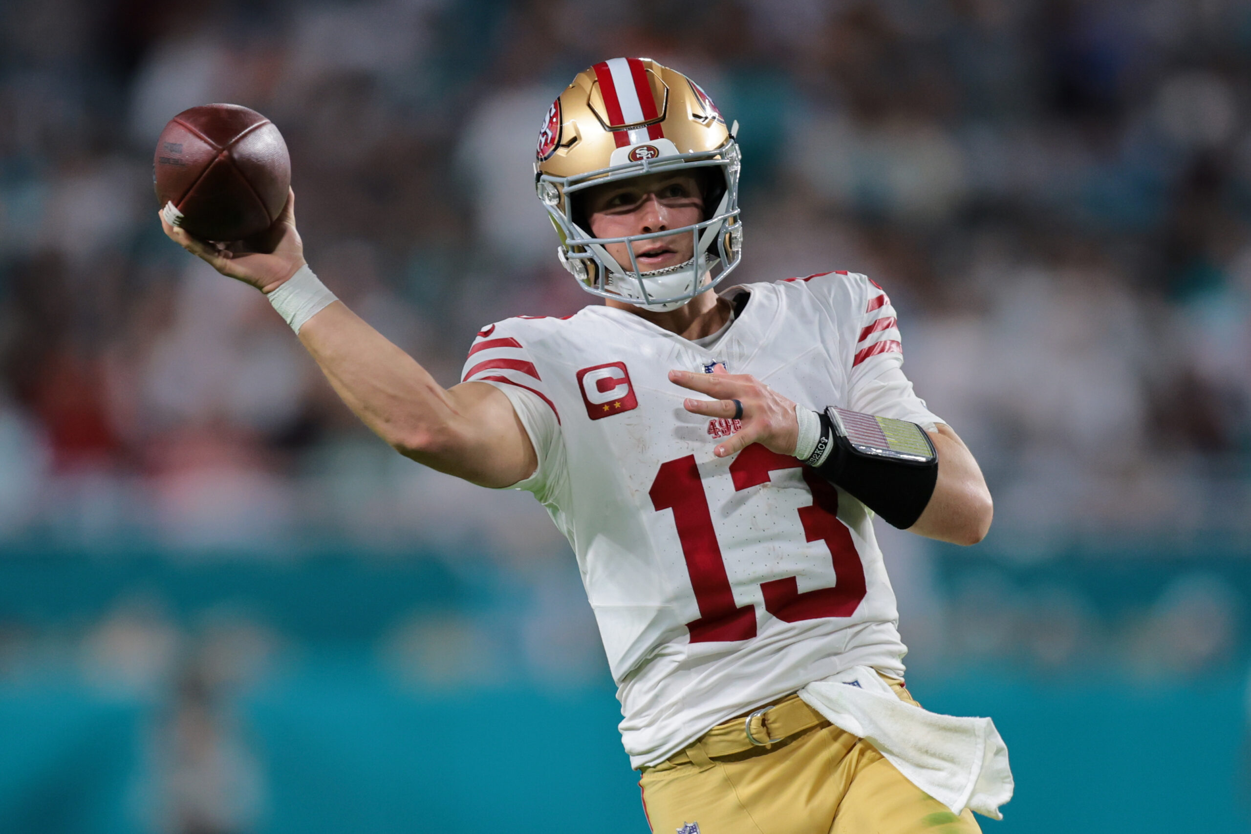 San Francisco 49ers quarterback Brock Purdy (13) throws the football against the Miami Dolphins during the fourth quarter at Hard Rock Stadium.