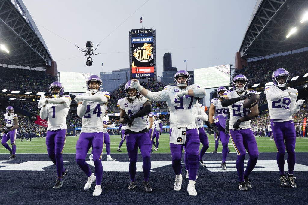 Minnesota Vikings safety Theo Jackson (26, second from right) leads a dance with cornerback Shaquill Griffin (1), safety Camryn Bynum (24), safety Josh Metellus (44), defensive tackle Harrison Phillips (97) and cornerback Dwight McGlothern (29) following his interception against the Seattle Seahawks during the fourth quarter.