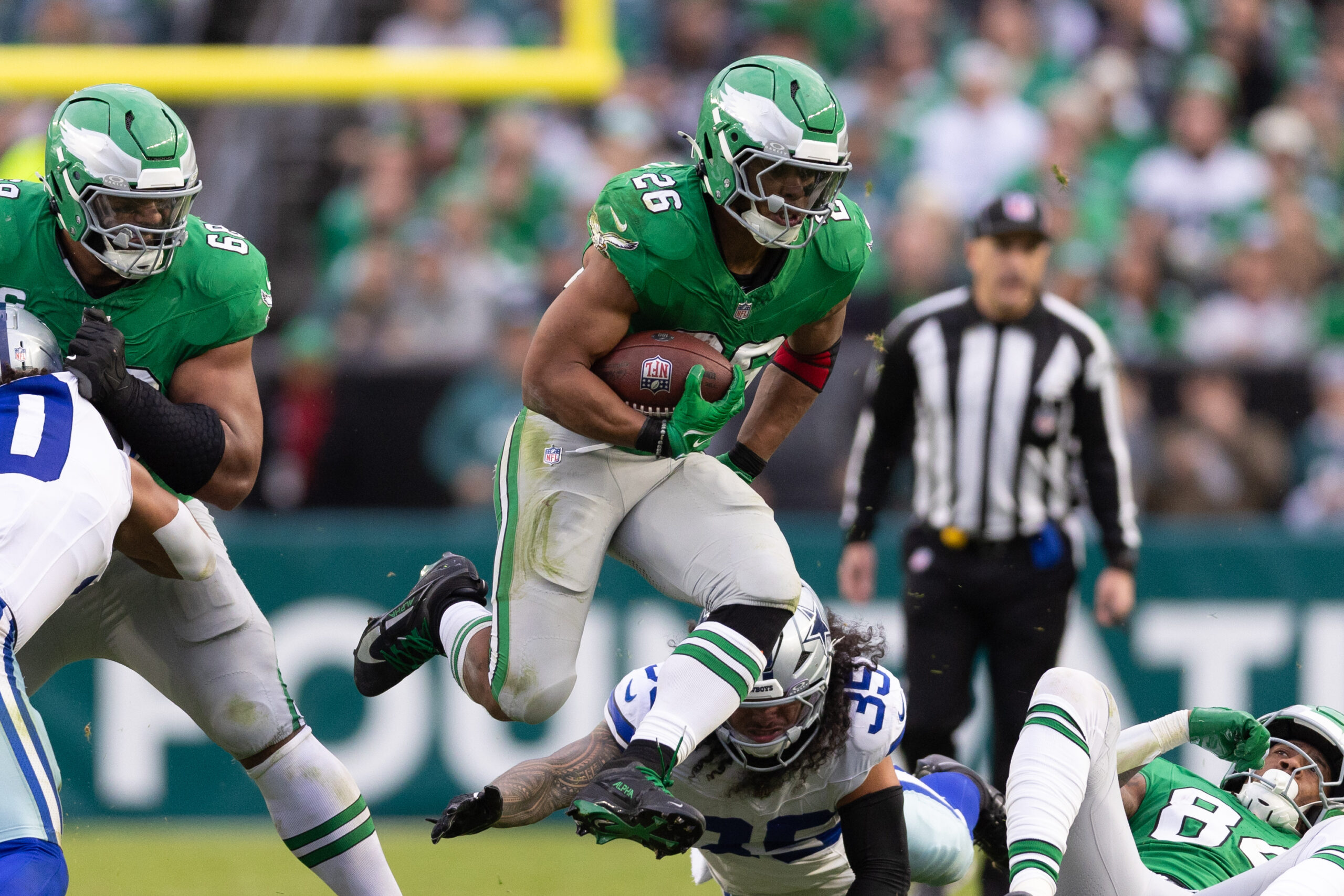 Philadelphia Eagles running back Saquon Barkley (26) runs with the ball during the fourth quarter against the Dallas Cowboys at Lincoln Financial Field.