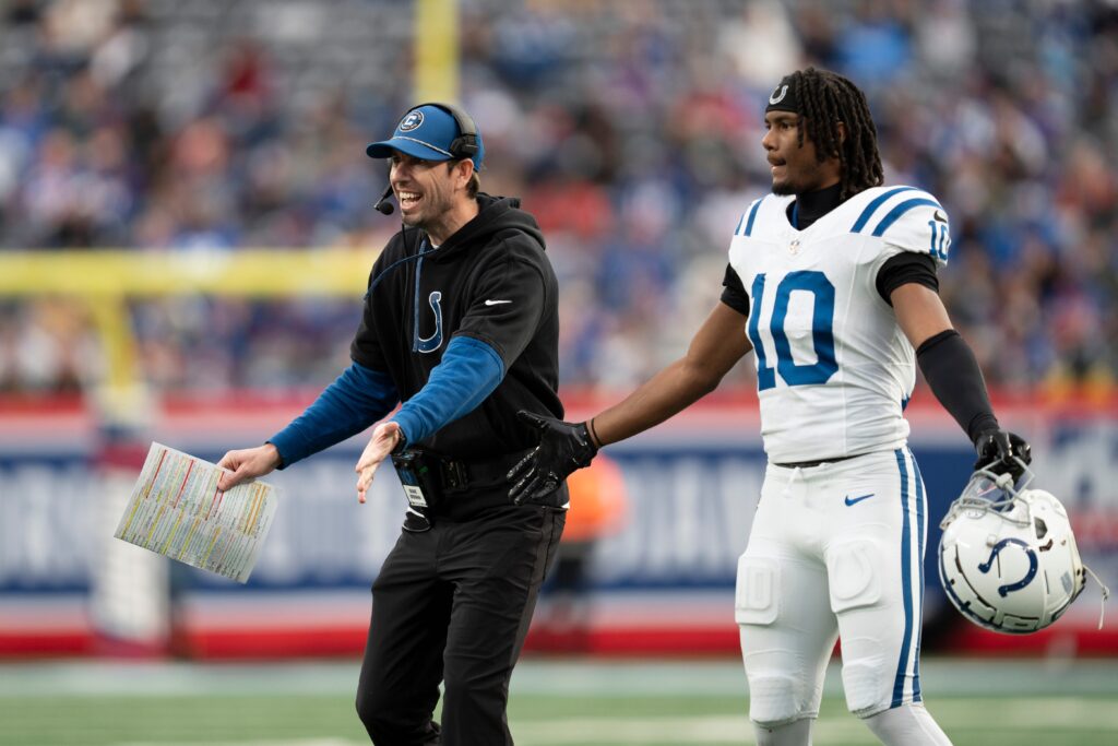 Indianapolis Colts head coach Shane Steichen and wide receiver Adonai Mitchell (10) react after their team scores a touchdown during a game between New York Giants and Indianapolis Colts at MetLife Stadium.