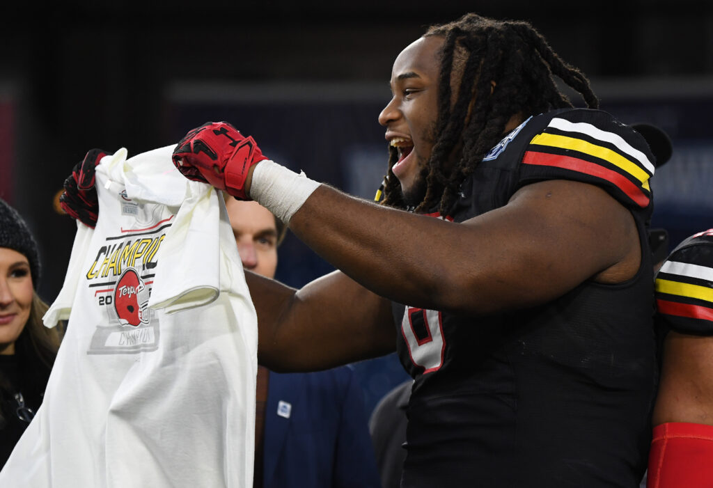 Maryland Terrapins defensive lineman Jordan Phillips (8) celebrates after a win against the Auburn Tigers at Nissan Stadium. 