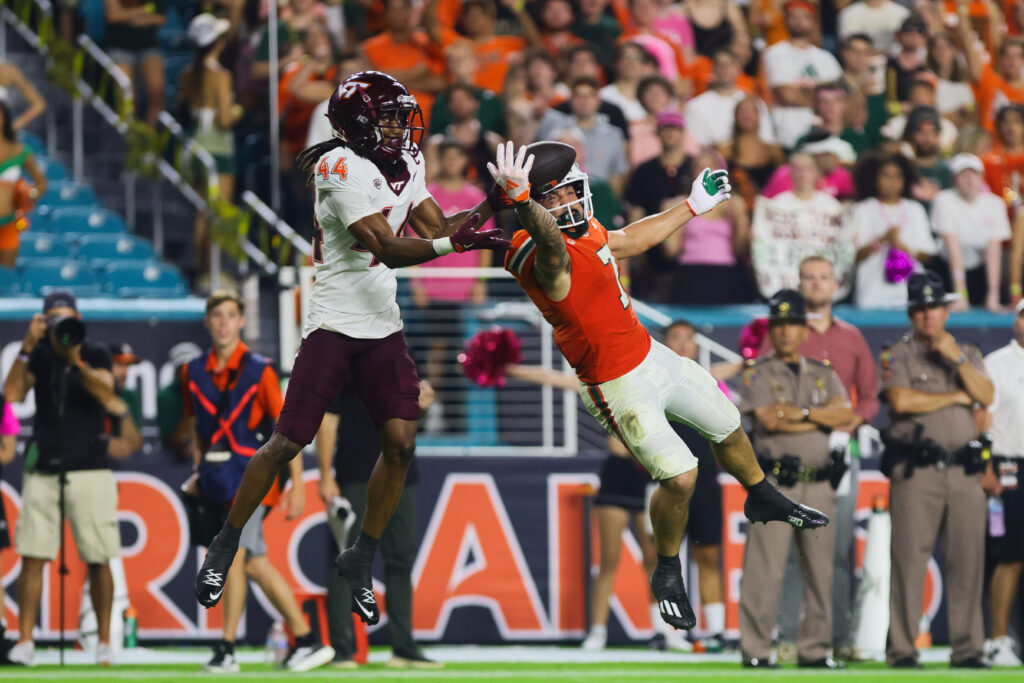 Miami Hurricanes wide receiver Xavier Restrepo (7) jumps but cannot make a catch against Virginia Tech Hokies cornerback Dorian Strong (44).