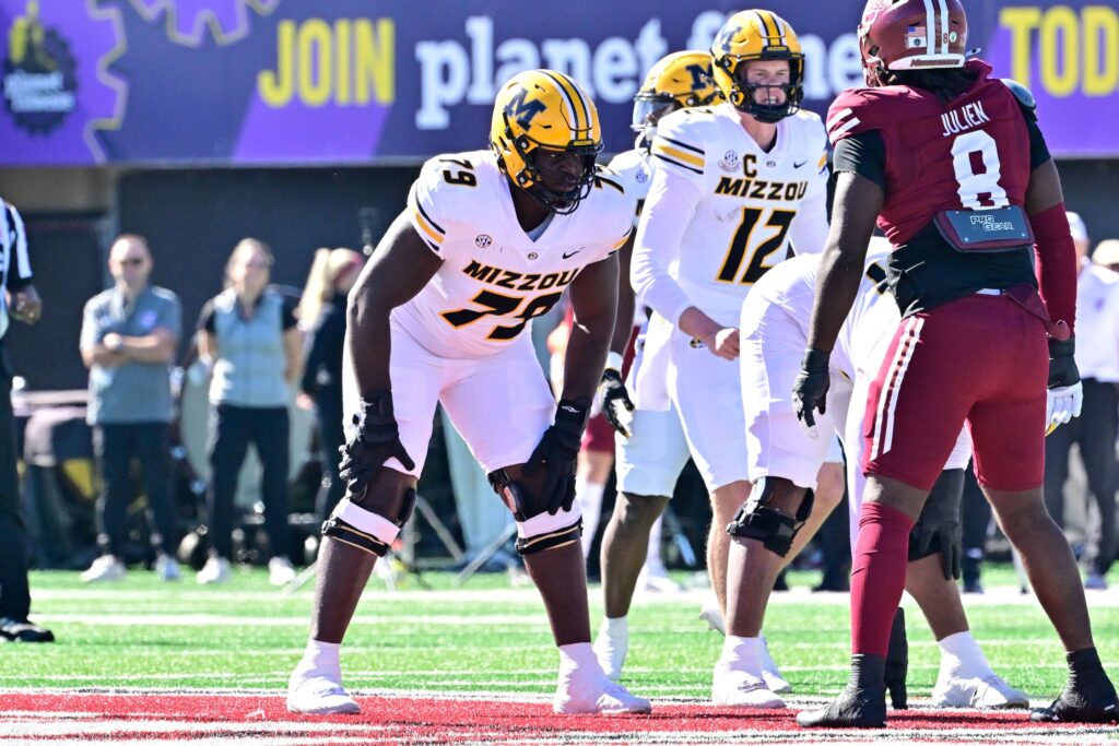 Oct 12, 2024; Amherst, Massachusetts, USA; Missouri Tigers offensive lineman Armand Membou (79) lines up against the Massachusetts Minutemen during the first half at Warren McGuirk Alumni Stadium. Mandatory Credit: Eric Canha-Imagn Images