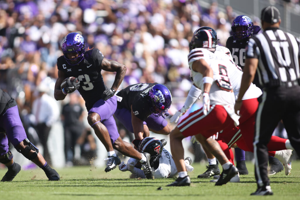 TCU Horned Frogs wide receiver Savion Williams (3) runs for a touchdown against the Texas Tech Red Raiders in the first quarter at Amon G. Carter Stadium.