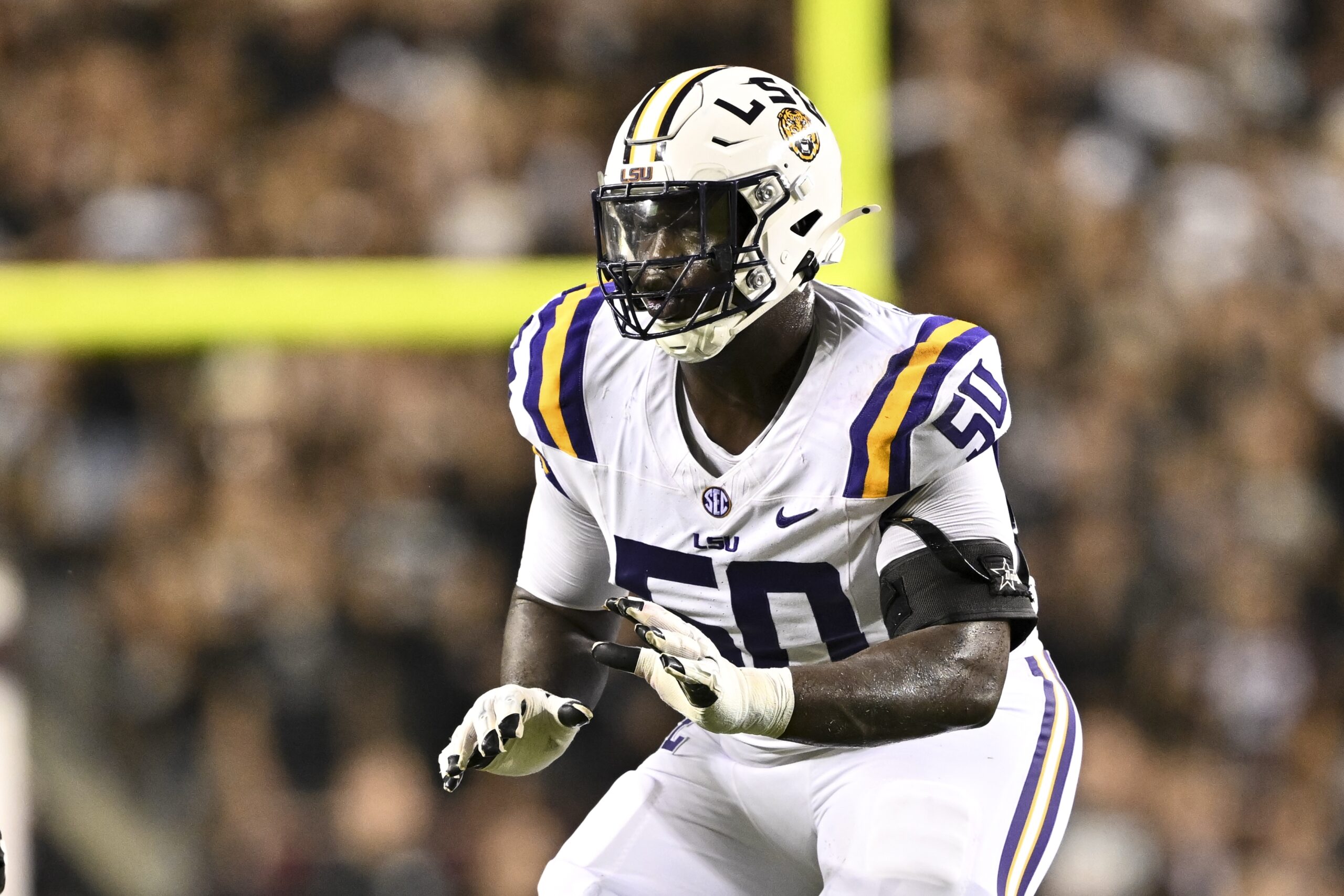 LSU Tigers offensive lineman Emery Jones Jr. (50) lines up during the second quarter against the Texas A&M Aggies.