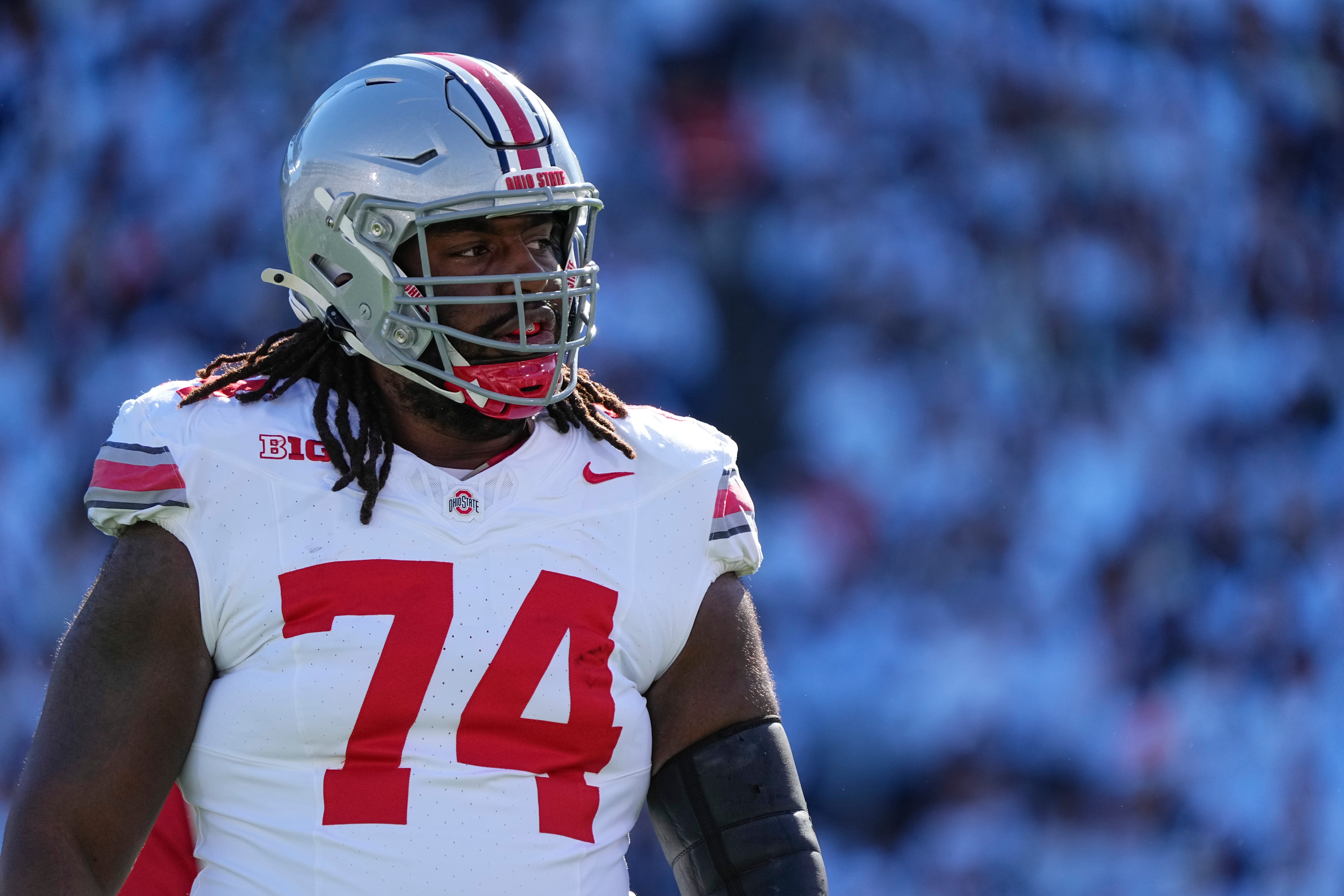 Ohio State Buckeyes offensive lineman Donovan Jackson (74) warms up prior to the game against the Penn State Nittany Lions at Beaver Stadium in University Park, Pa.