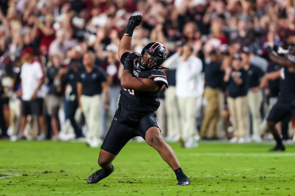 South Carolina Gamecocks defensive tackle T.J. Sanders (90) sacks Missouri Tigers quarterback Brady Cook (12) in the second quarter at Williams-Brice Stadium.