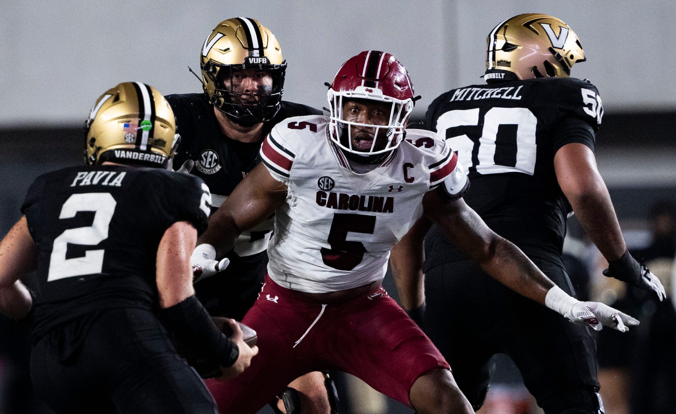 South Carolina Gamecocks edge Kyle Kennard (5) reacts as Vanderbilt Commodores quarterback Diego Pavia (2) protects the ball.