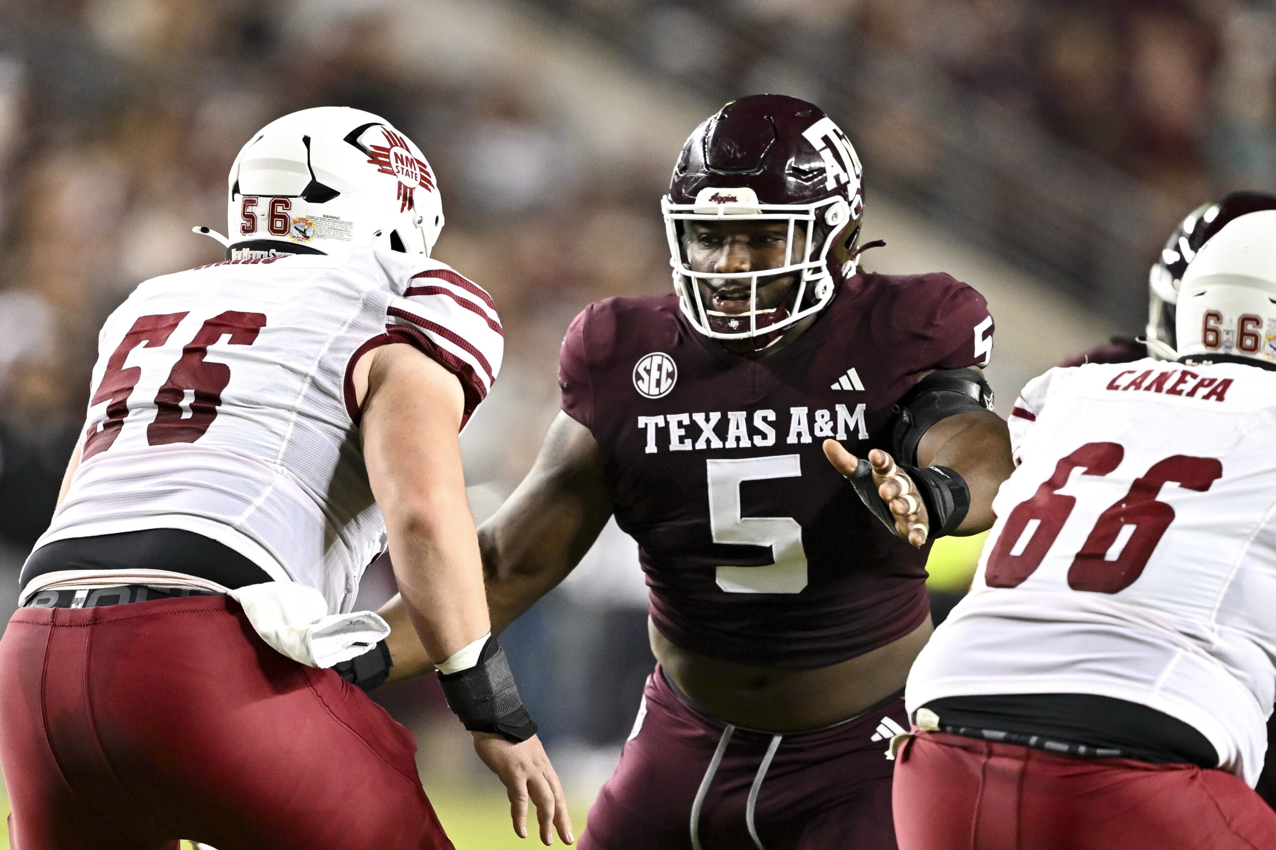 Texas A&M Aggies defensive lineman Shemar Turner (5) defends in coverage against the New Mexico State Aggies during the first half at Kyle Field.