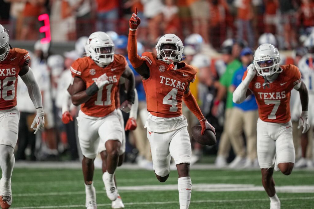 Texas Longhorns defensive back Andrew Mukuba (4) celebrates a interception against Kentucky Wildcats late in the fourth quarter at Darrell K Royal Texas Memorial Stadium, Austin, Texas.