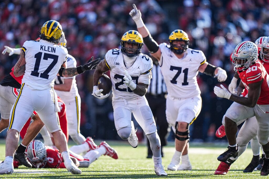 Michigan running back Kalel Mullings (20) runs against Ohio State during the second half at Ohio Stadium in Columbus.