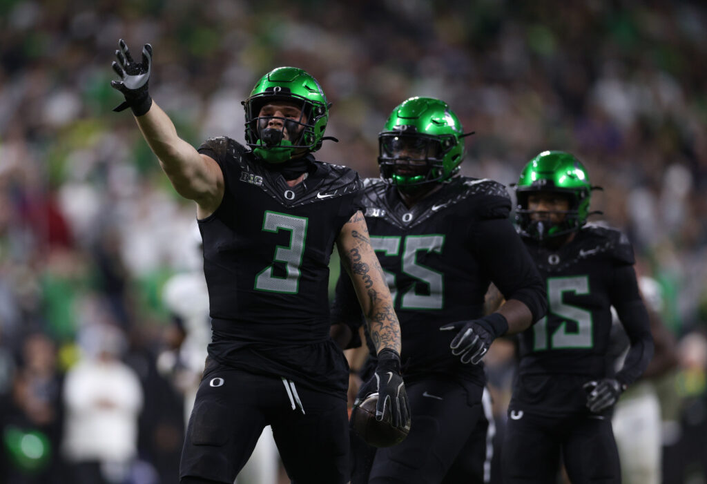 Oregon Ducks tight end Terrance Ferguson (3) celebrates after a run for a gain against the Penn State Nittany Lions during the fourth quarter in the 2024 Big Ten Championship.