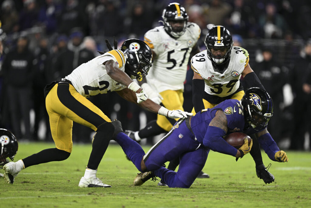 Baltimore Ravens running back Derrick Henry (22) divers for extra yard during the second half against the Pittsburgh Steelers at M&T Bank Stadium.