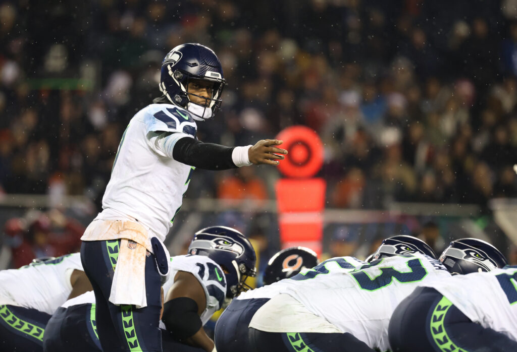 Seattle Seahawks quarterback Geno Smith (7) directs a play prior to the snap during the fourth quarter against the Chicago Bears at Soldier Field. 