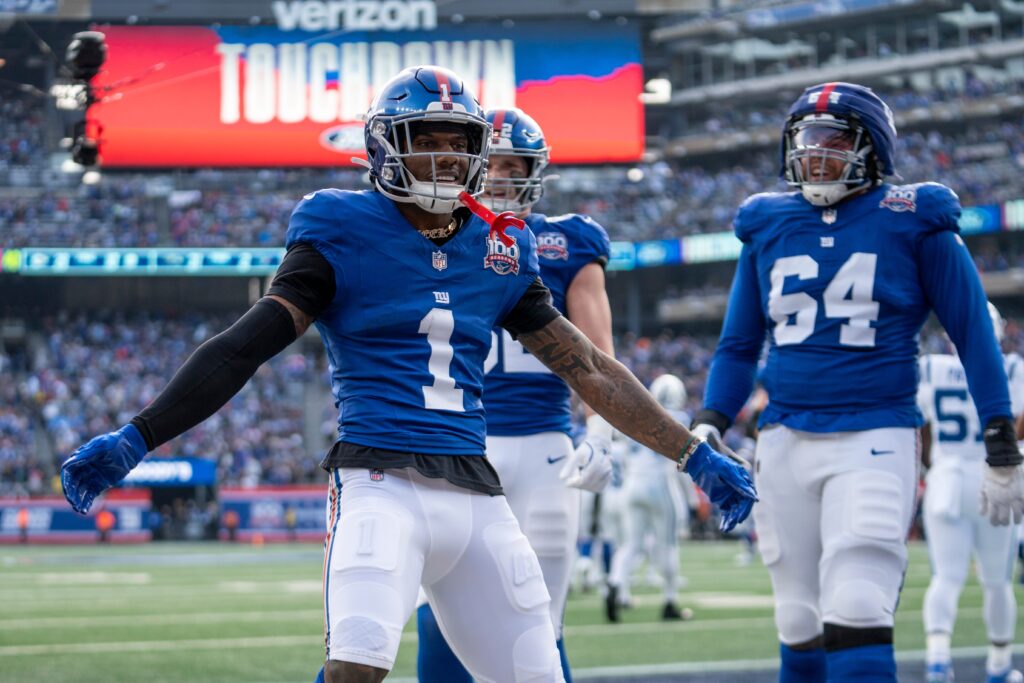 New York Giants wide receiver Malik Nabers (1) celebrates with his teammates after scoring a touchdown during a game between New York Giants and Indianapolis Colts.