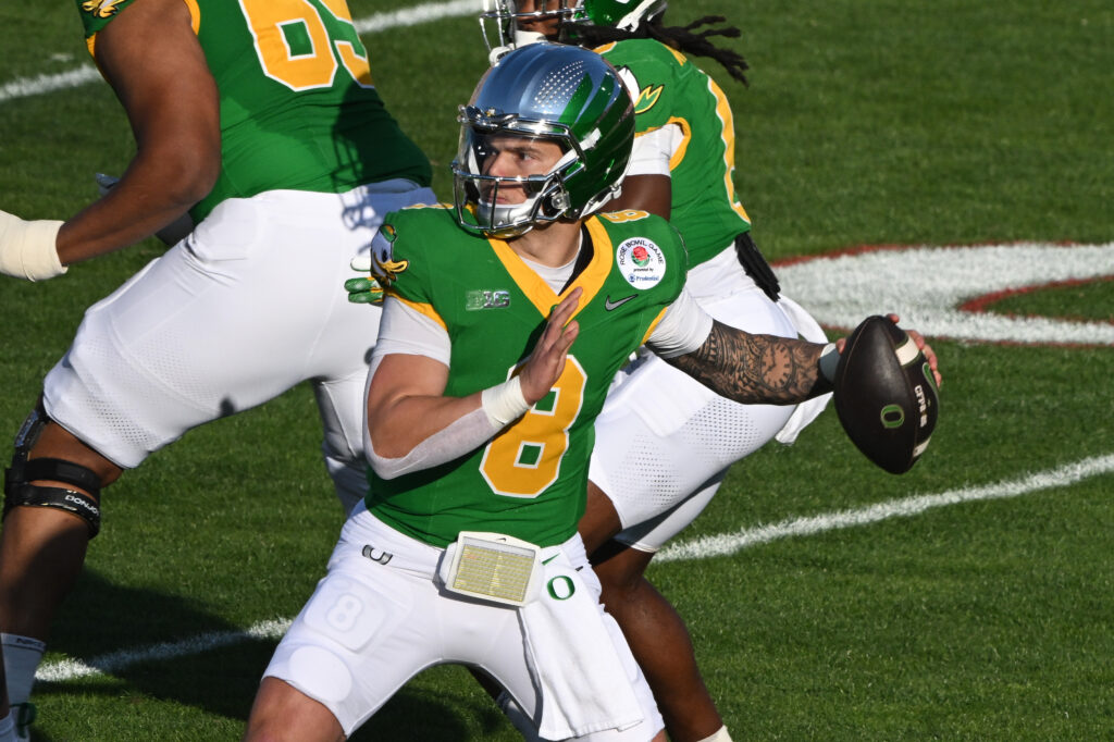 Oregon Ducks quarterback Dillon Gabriel (8) throws a pass during the second quarter against the Ohio State Buckeyes at Rose Bowl Stadium.