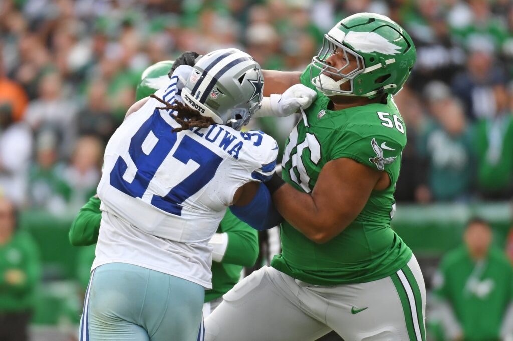 Philadelphia Eagles guard Tyler Steen (56) blocks Dallas Cowboys defensive tackle Osa Odighizuwa (97).