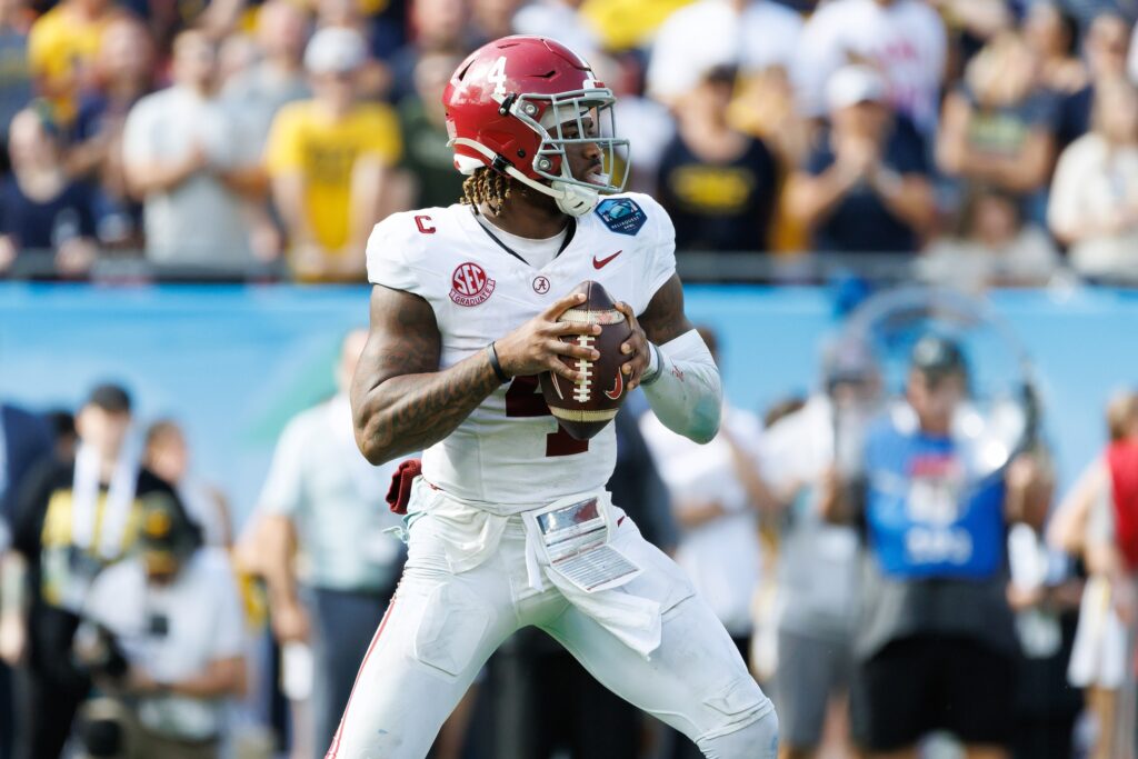 Alabama Crimson Tide quarterback Jalen Milroe (4) looks to throw against the Michigan Wolverines during the second half at Raymond James Stadium.