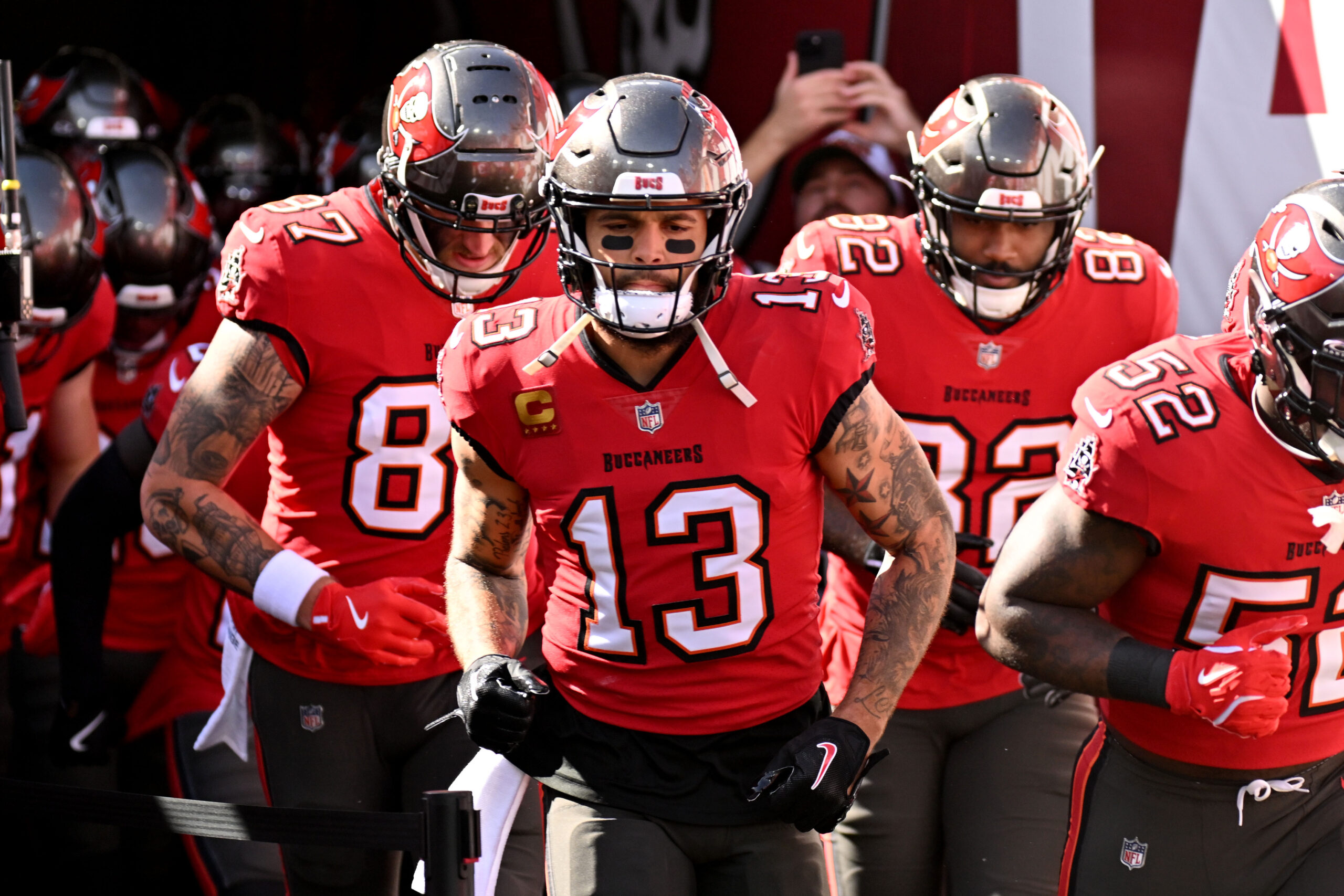 Tampa Bay Buccaneers wide receiver Mike Evans (13) jogs on to the field before the start of the game against the New Orleans Saints at Raymond James Stadium.