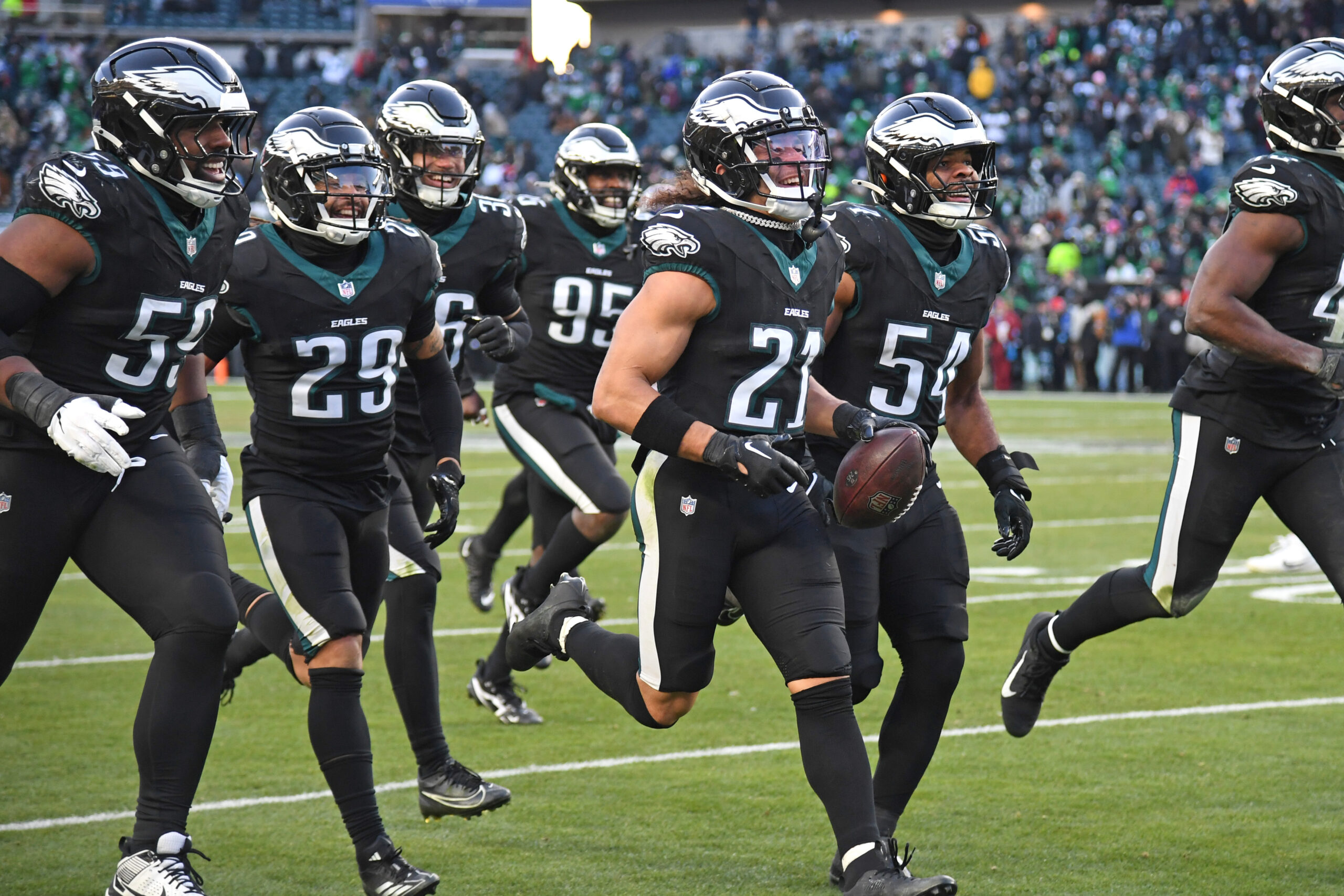 Philadelphia Eagles safety Sydney Brown (21) celebrates his interception with teammates against the New York Giants during the fourth quarter at Lincoln Financial Field.