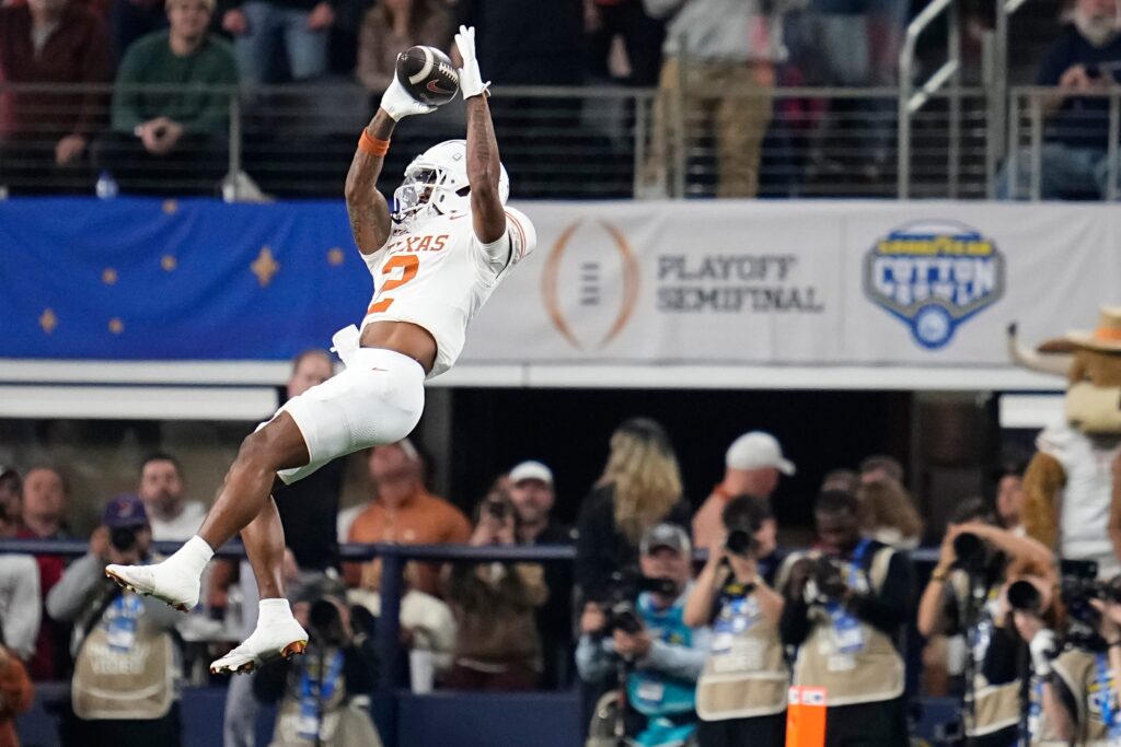 Texas Longhorns wide receiver Matthew Golden (2) catches a pass during the second half of the Cotton Bowl Classic College Football Playoff semifinal game against the Ohio State Buckeyes at AT&T Stadium.