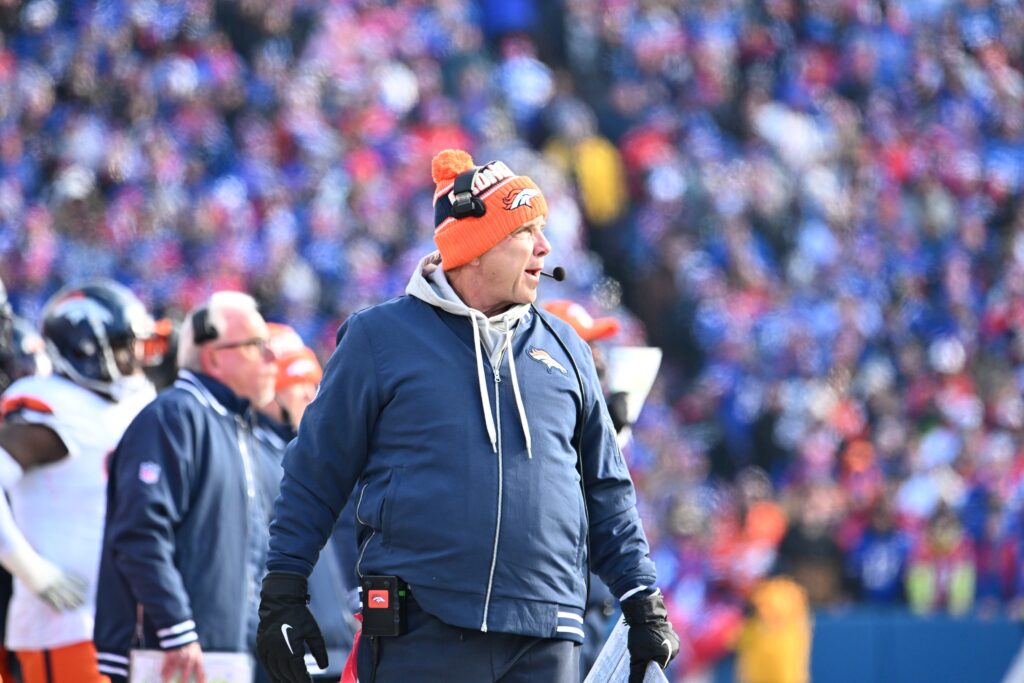 Denver Broncos head coach Sean Payton watches play downfield during the first quarter against the Buffalo Bills in an AFC wild card game at Highmark Stadium.