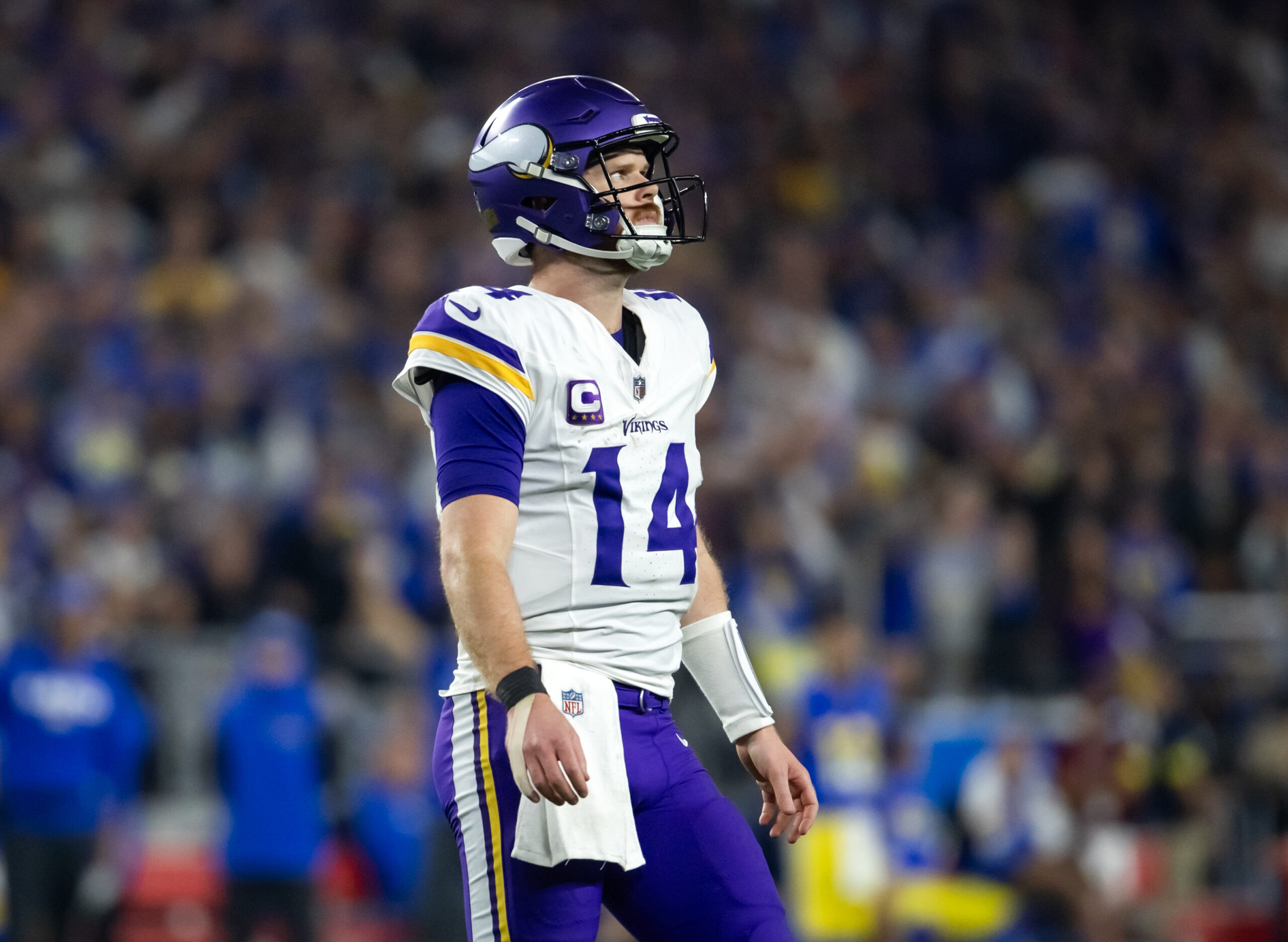 Minnesota Vikings quarterback Sam Darnold (14) reacts against the Los Angeles Rams in the second half during an NFC wild card game at State Farm Stadium.