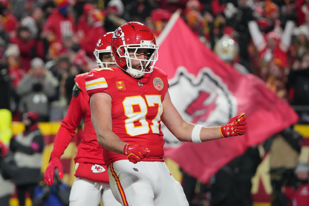 Kansas City Chiefs tight end Travis Kelce (87) reacts after catching a pass for a touchdown against the Houston Texans during the fourth quarter of a 2025 AFC divisional round game at GEHA Field at Arrowhead Stadium. 