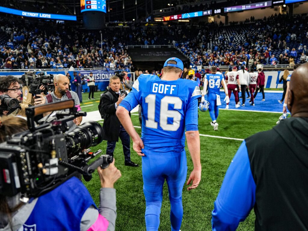 Detroit Lions quarterback Jared Goff walks off the field after losing to the Washington Commanders 45-31 in the NFC divisional round of the NFL playoffs at Ford Field.