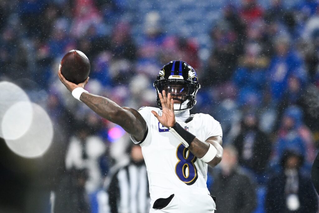 Baltimore Ravens quarterback Lamar Jackson (8) throws the ball during warm ups before the game against the Buffalo Bills in a 2025 AFC divisional round.