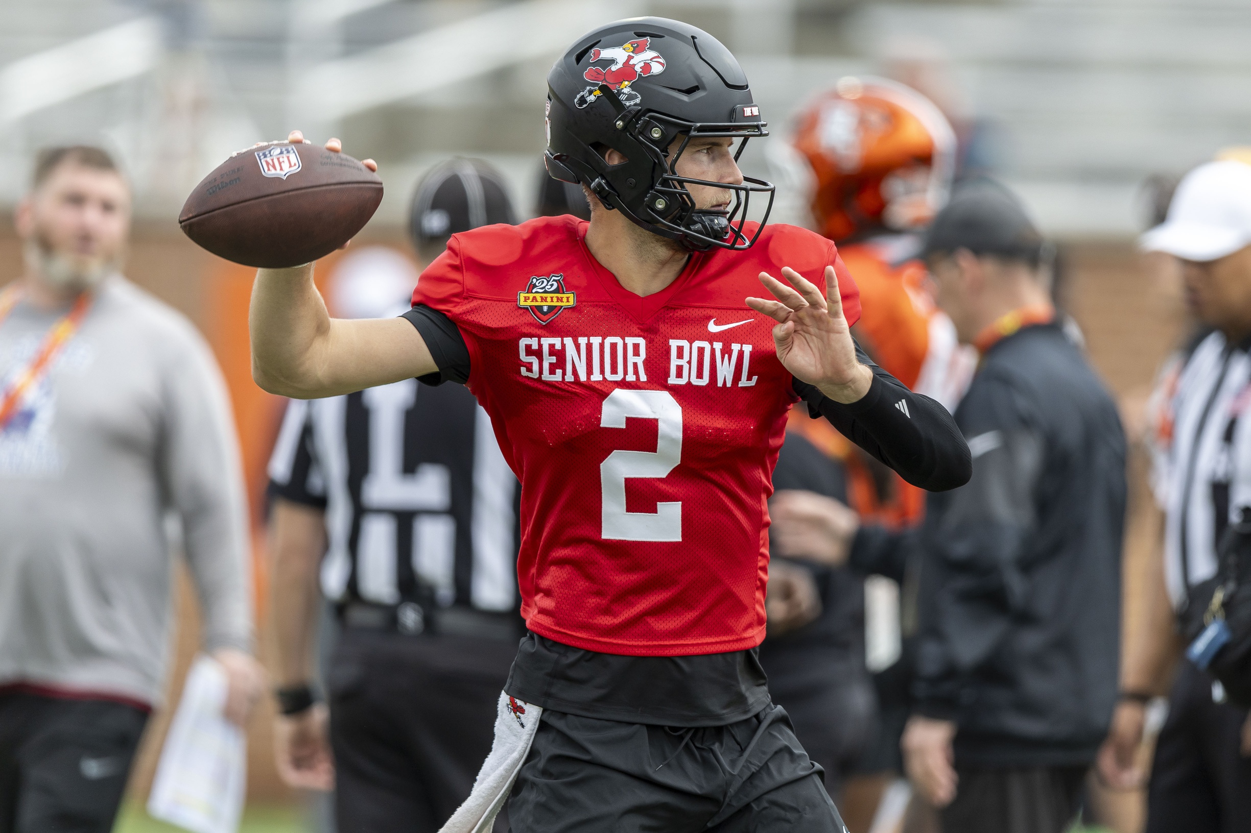 National team quarterback Tyler Shough of Louisville (2) works through drills during Senior Bowl practice for the National team.