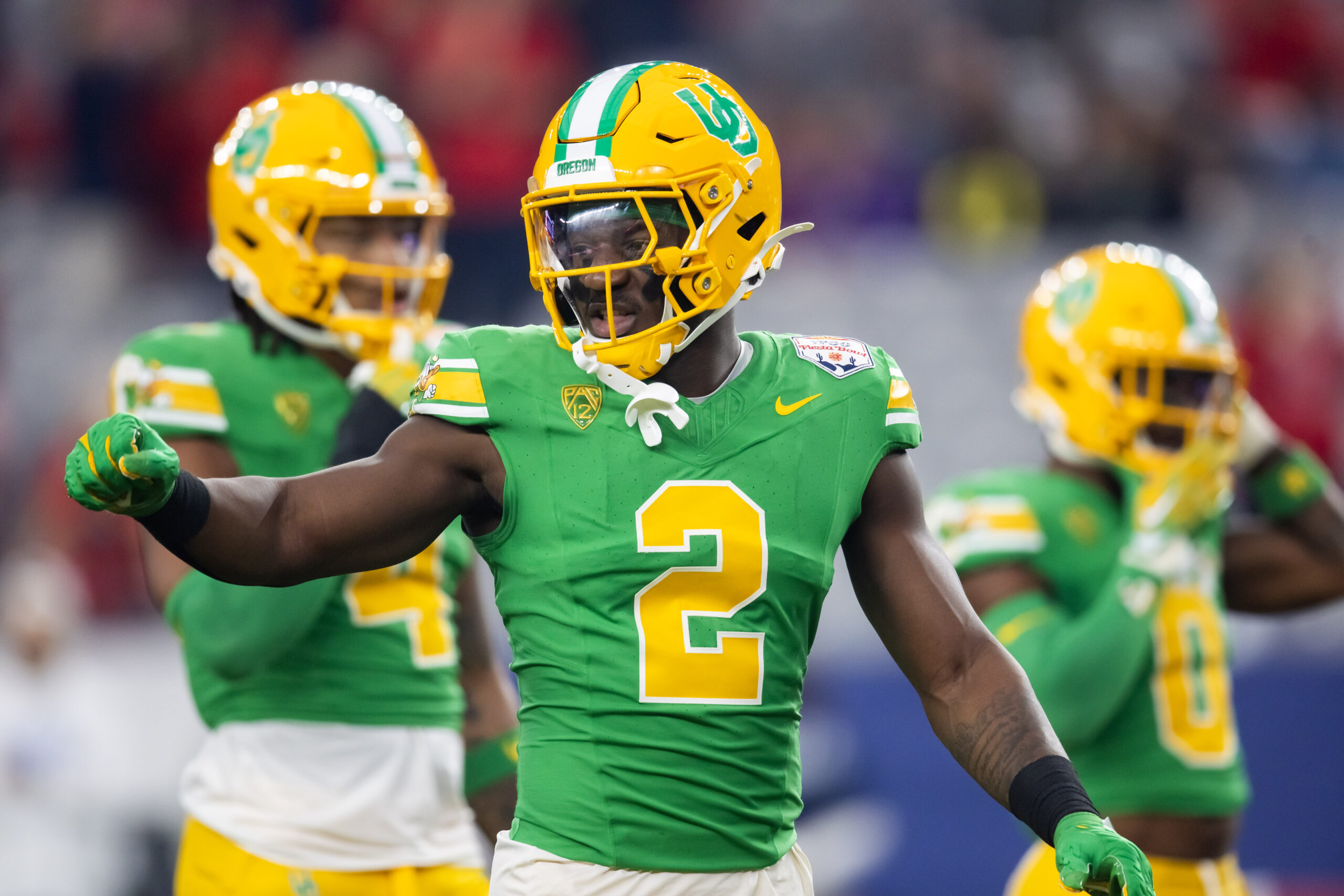 Oregon Ducks linebacker Jeffrey Bassa (2) against the Liberty Flames during the 2024 Fiesta Bowl at State Farm Stadium.