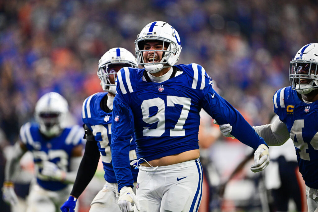 Indianapolis Colts defensive end Laiatu Latu (97) celebrates a sack during the second half against the Chicago Bears at Lucas Oil Stadium. 