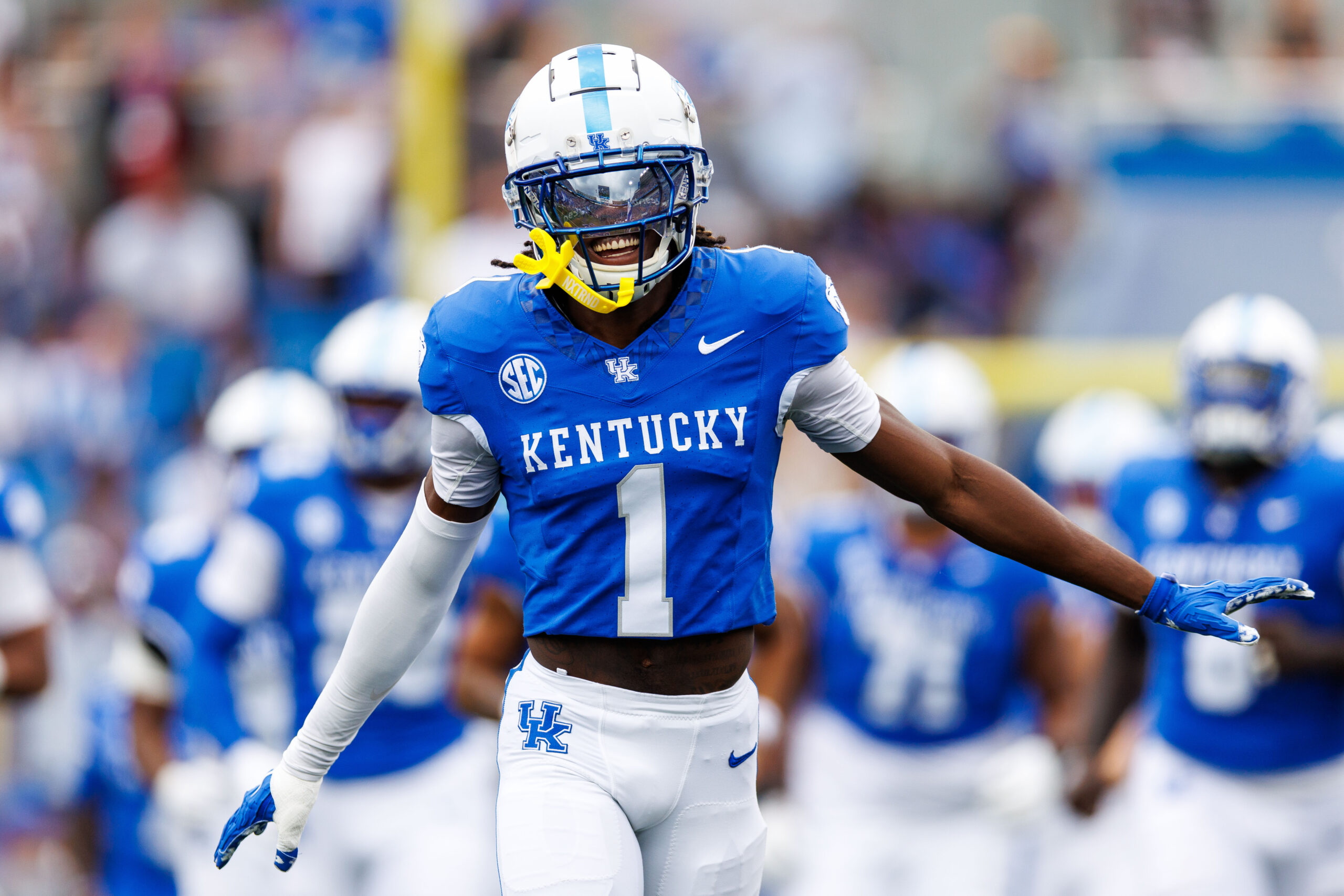 Kentucky Wildcats defensive back Maxwell Hairston (1) runs onto the field before the game against the Ohio Bobcats.