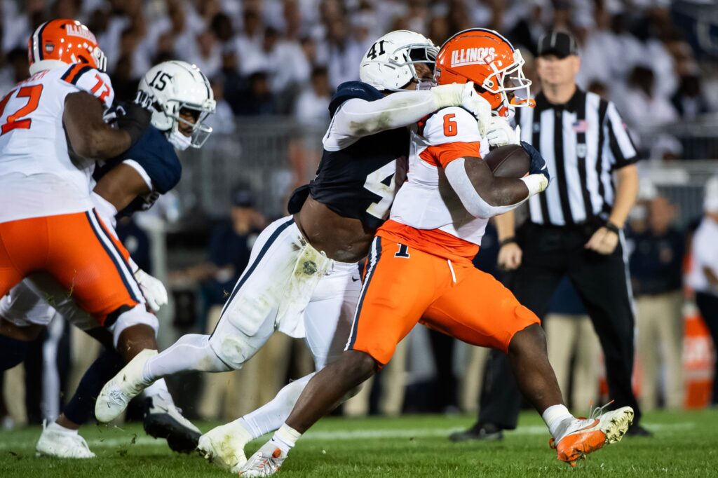 Penn State linebacker Kobe King (41) tackles Illinois running back Josh McCray (6) in the third quarter of a Big Ten football game, Saturday.