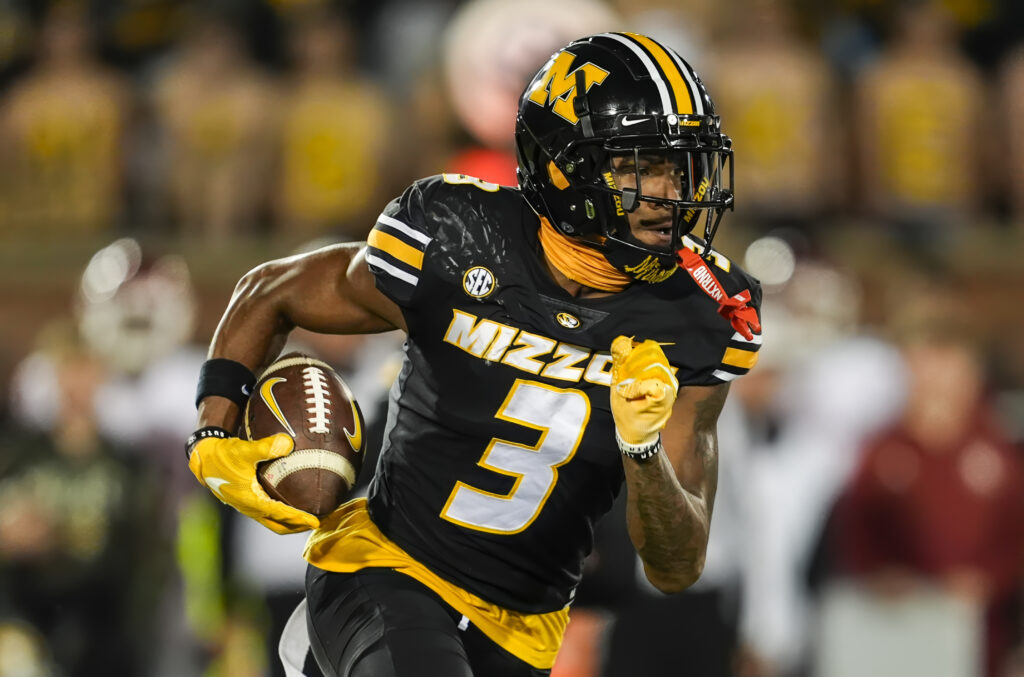 Missouri Tigers wide receiver Luther Burden III (3) runs with the ball during the first half against the Oklahoma Sooners at Faurot Field at Memorial Stadium.