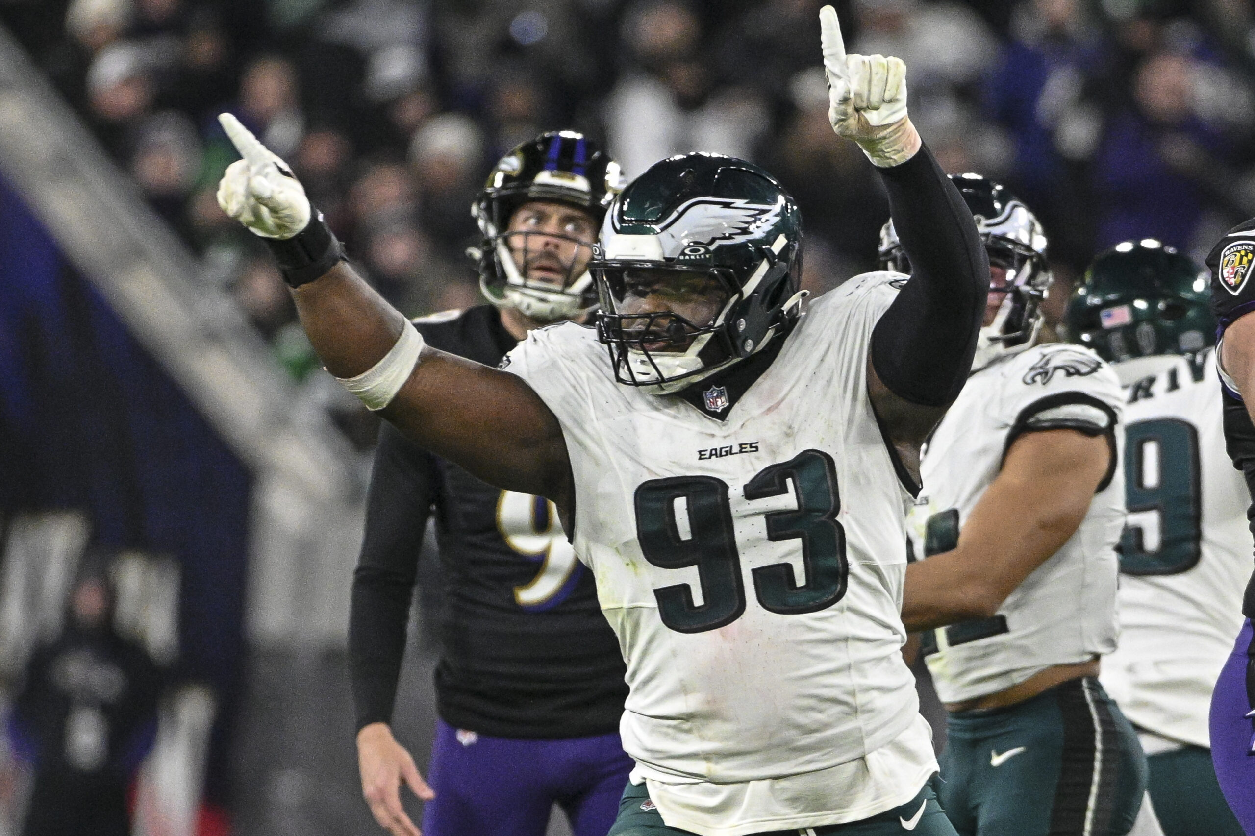 Philadelphia Eagles defensive tackle Milton Williams (93) celebrates as Baltimore Ravens place kicker Justin Tucker (9) reacts to missing a second half field goal at M&T Bank Stadium.