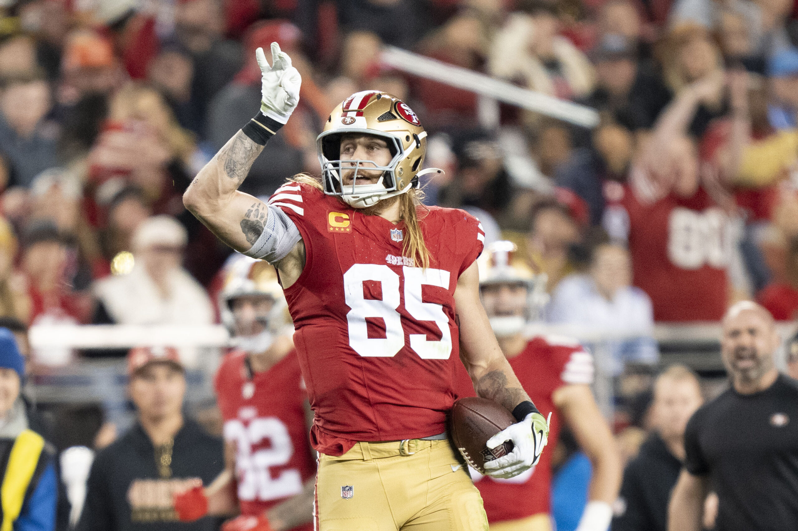 San Francisco 49ers tight end George Kittle (85) celebrates a first down against the Detroit Lions during the fourth quarter at Levi's Stadium.