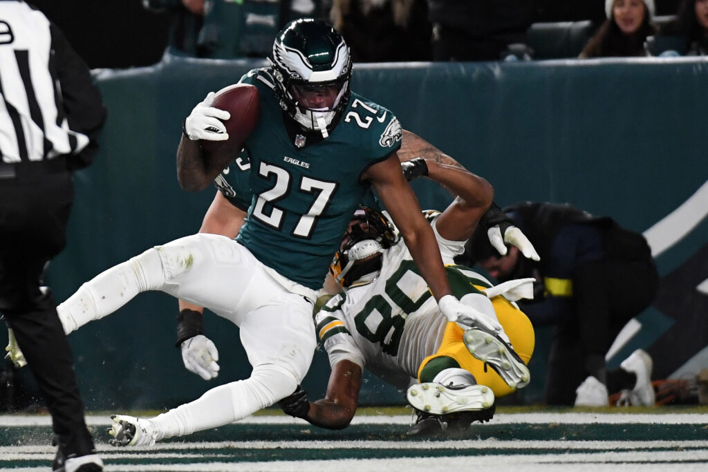 Philadelphia Eagles cornerback Quinyon Mitchell (27) intercepts a pass against Green Bay Packers wide receiver Bo Melton (80) during the second half in an NFC wild card game. 