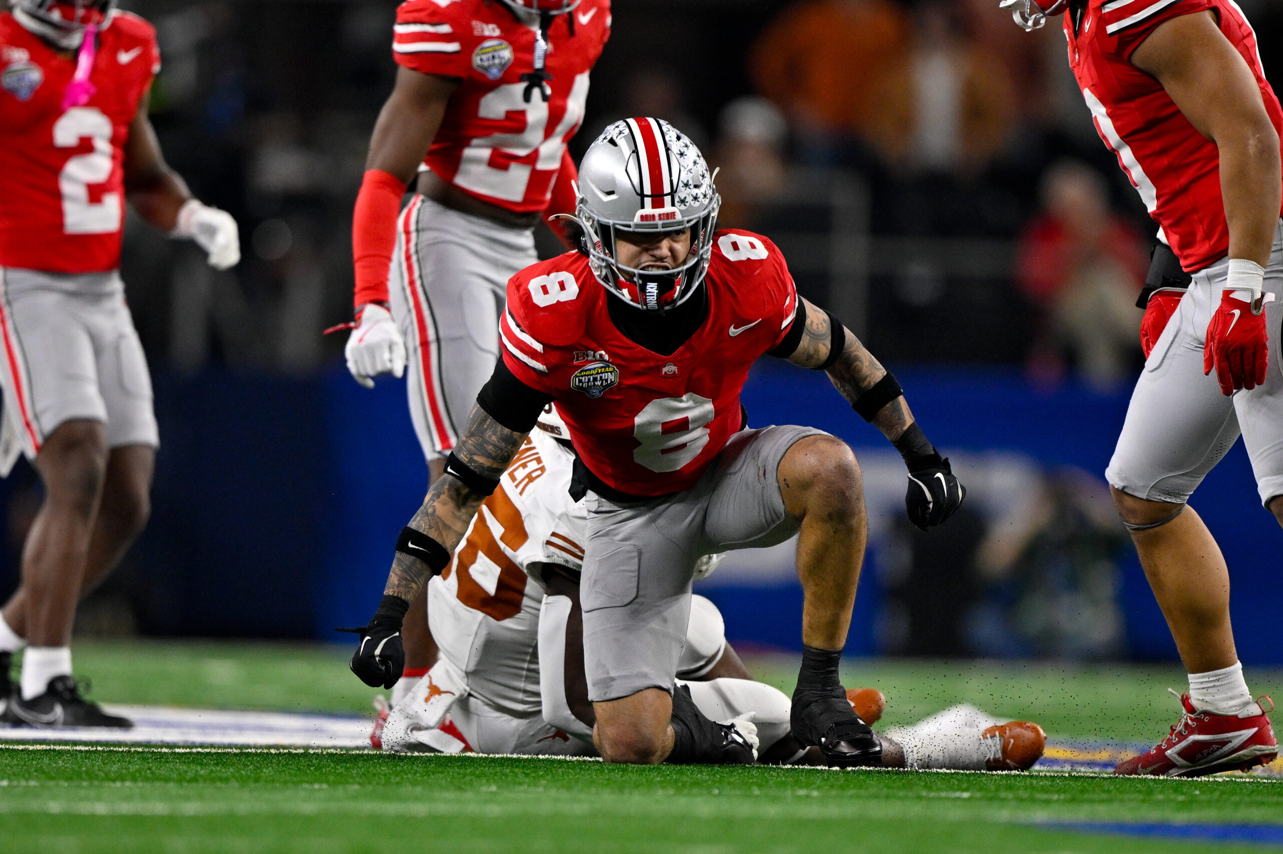 Ohio State Buckeyes safety Lathan Ransom (8) and Texas Longhorns running back Quintrevion Wisner (26) in action during the game between the Texas Longhorns and the Ohio State Buckeyes.