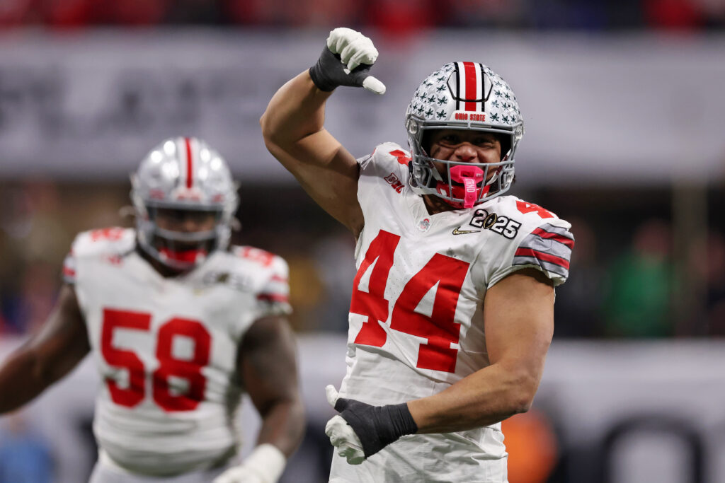 Ohio State Buckeyes defensive end JT Tuimoloau (44) reacts after a play against the Notre Dame Fighting Irish during the first half the CFP National Championship college football game.