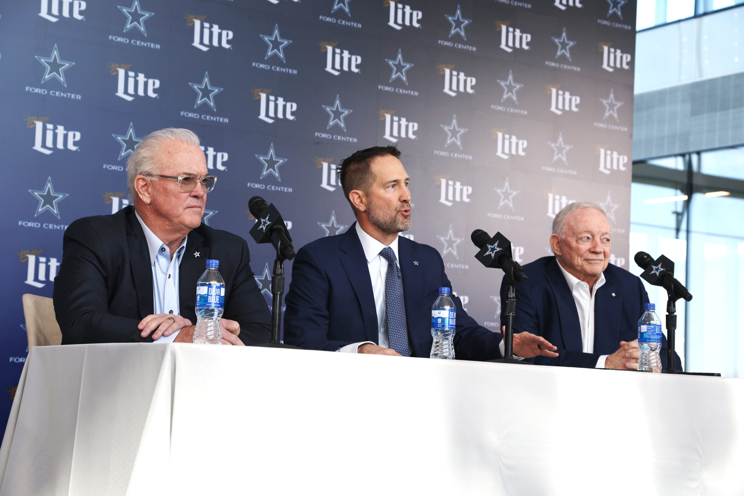 Dallas Cowboys CEO Stephen Jones, head coach Brian Schottenheimer and owner Jerry Jones speak to the media at a press conference at the Star.